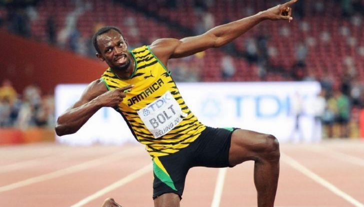 Usain Bolt, 6 volte medaglia d’oro alle Olimpiadi, sfida il fuoco - Foto 3 di 9