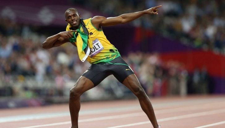 Usain Bolt, 6 volte medaglia d’oro alle Olimpiadi, sfida il fuoco - Foto 4 di 9