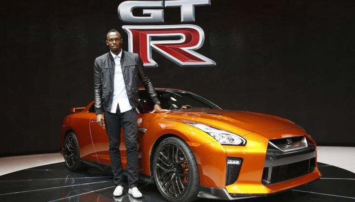 Usain Bolt, 6 volte medaglia d’oro alle Olimpiadi, sfida il fuoco - Foto 6 di 9